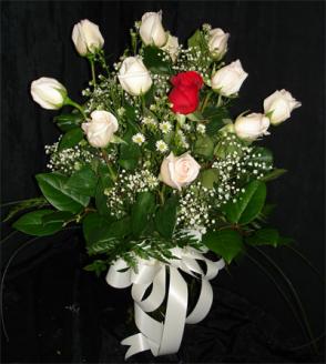 11 White Roses and 1 Red Rose